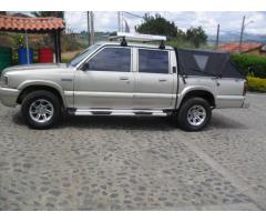 VENDO CAMIONETA MAZDA B2200 MODELO 1999