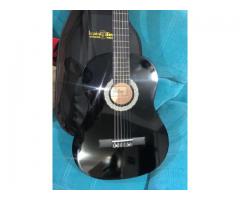Guitarra acústica Bogota NUEVA usada