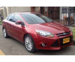 MOTIVO VIAJE, VENDO FORD FOCUS TITANIUM TP 2000CC 4P,  MODELO 2013