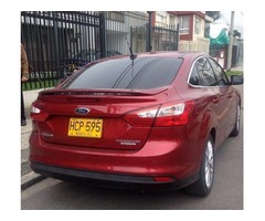 MOTIVO VIAJE, VENDO FORD FOCUS TITANIUM TP 2000CC 4P,  MODELO 2013