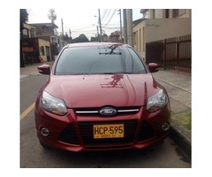 MOTIVO VIAJE, VENDO FORD FOCUS TITANIUM TP 2000CC 4P,  MODELO 2013